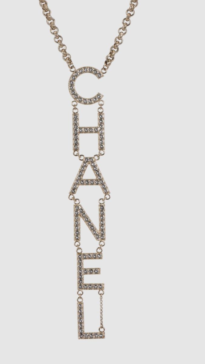 Preowned Chanel Champagne Gold Crystal Logo Necklace brass