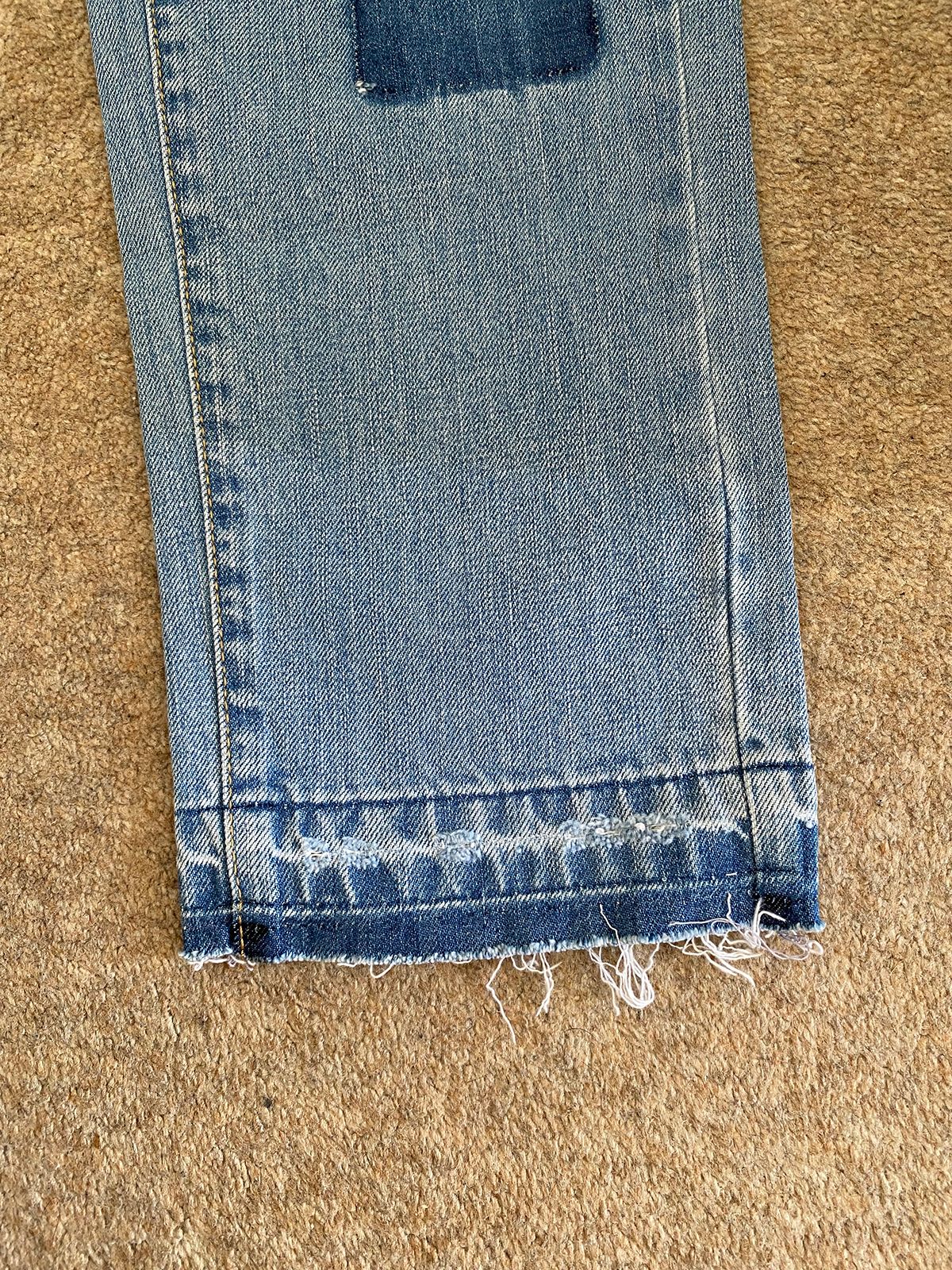 SJYP Mid-wash denim patchwork jeans Size M blue cotton