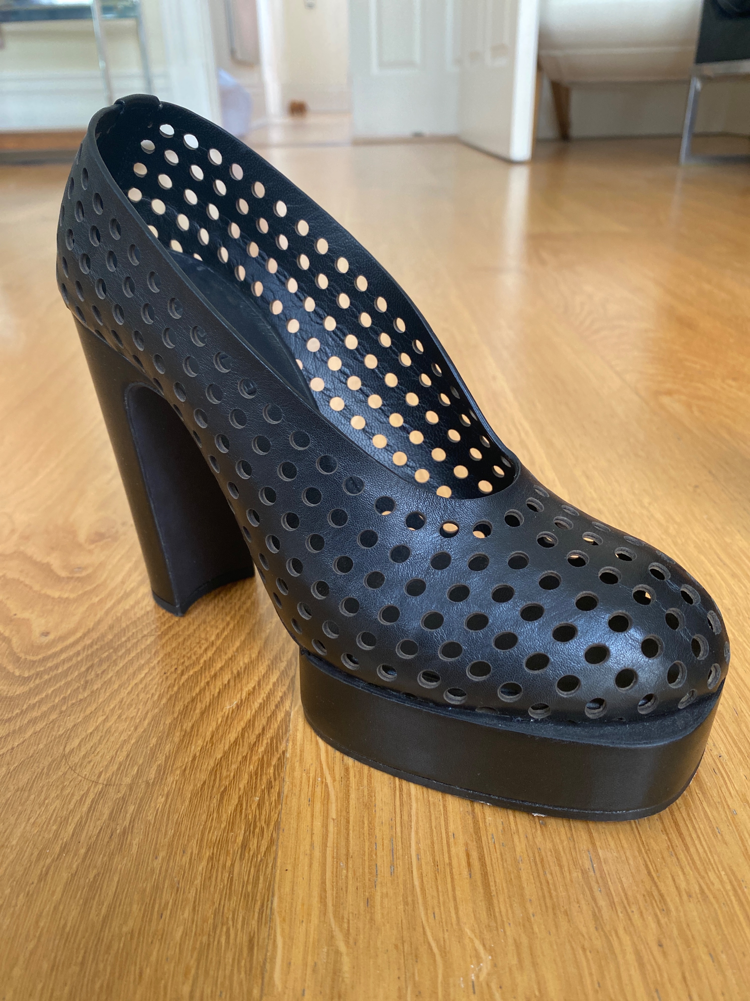 Preowned Jil Sander Black perforated leather platform heeled pumps Size 36