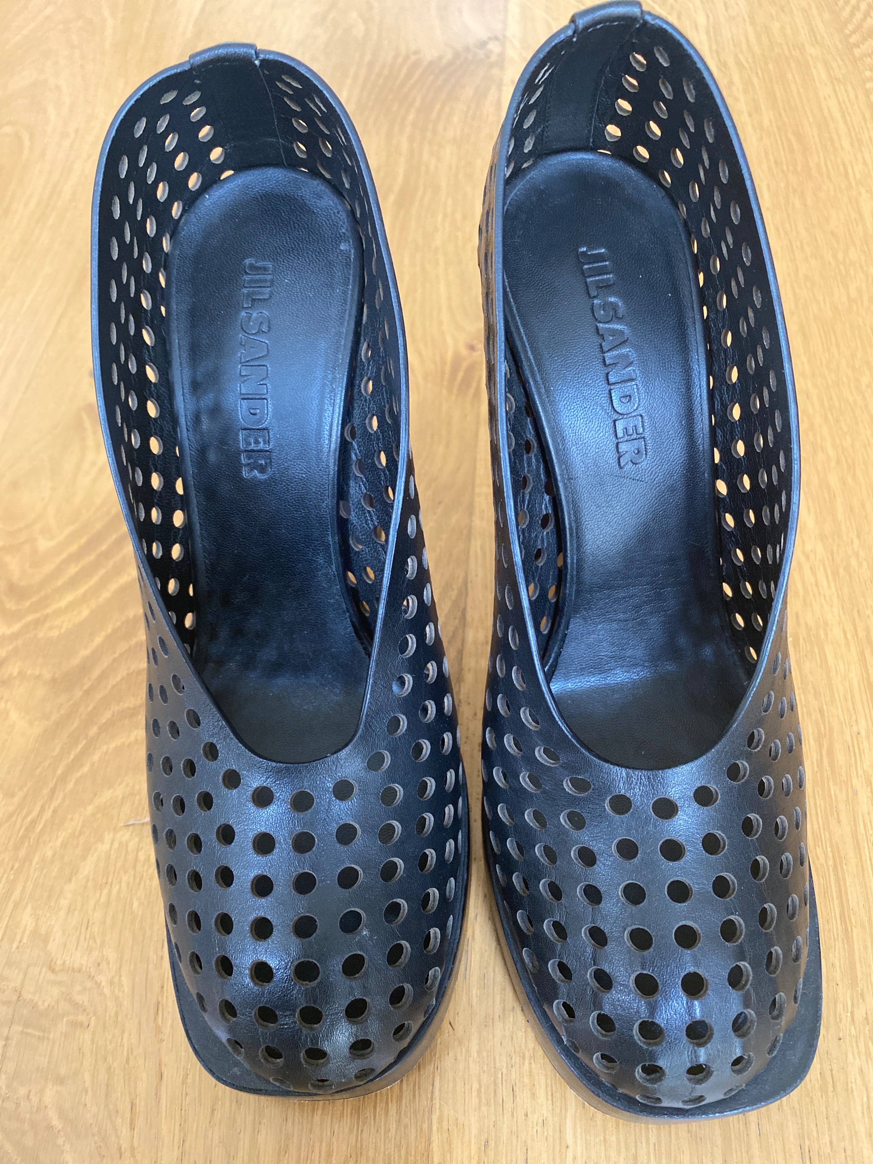 Preowned Jil Sander Black perforated leather platform heeled pumps Size 36