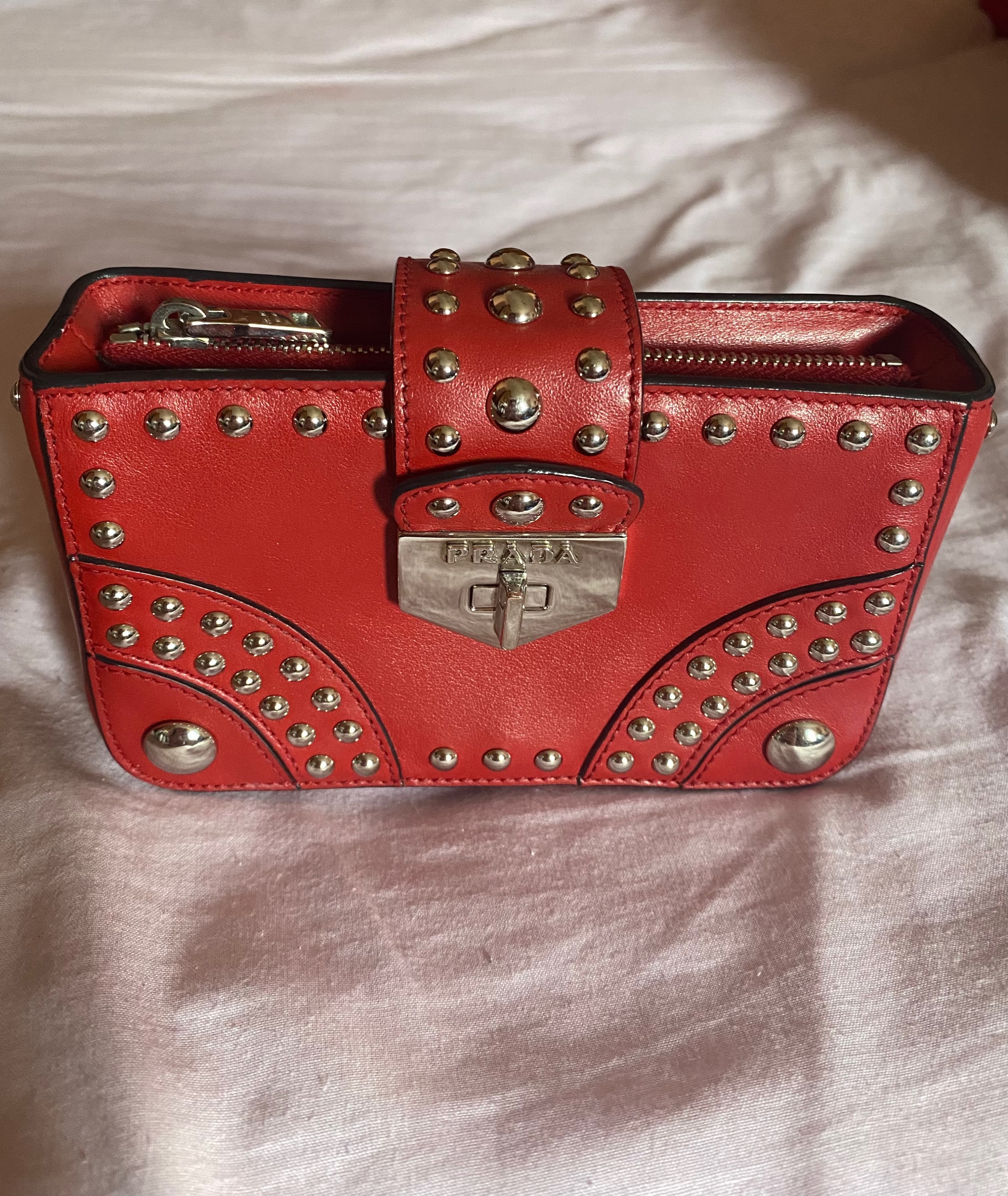 Prada Red studded leather clutch bag Size XS