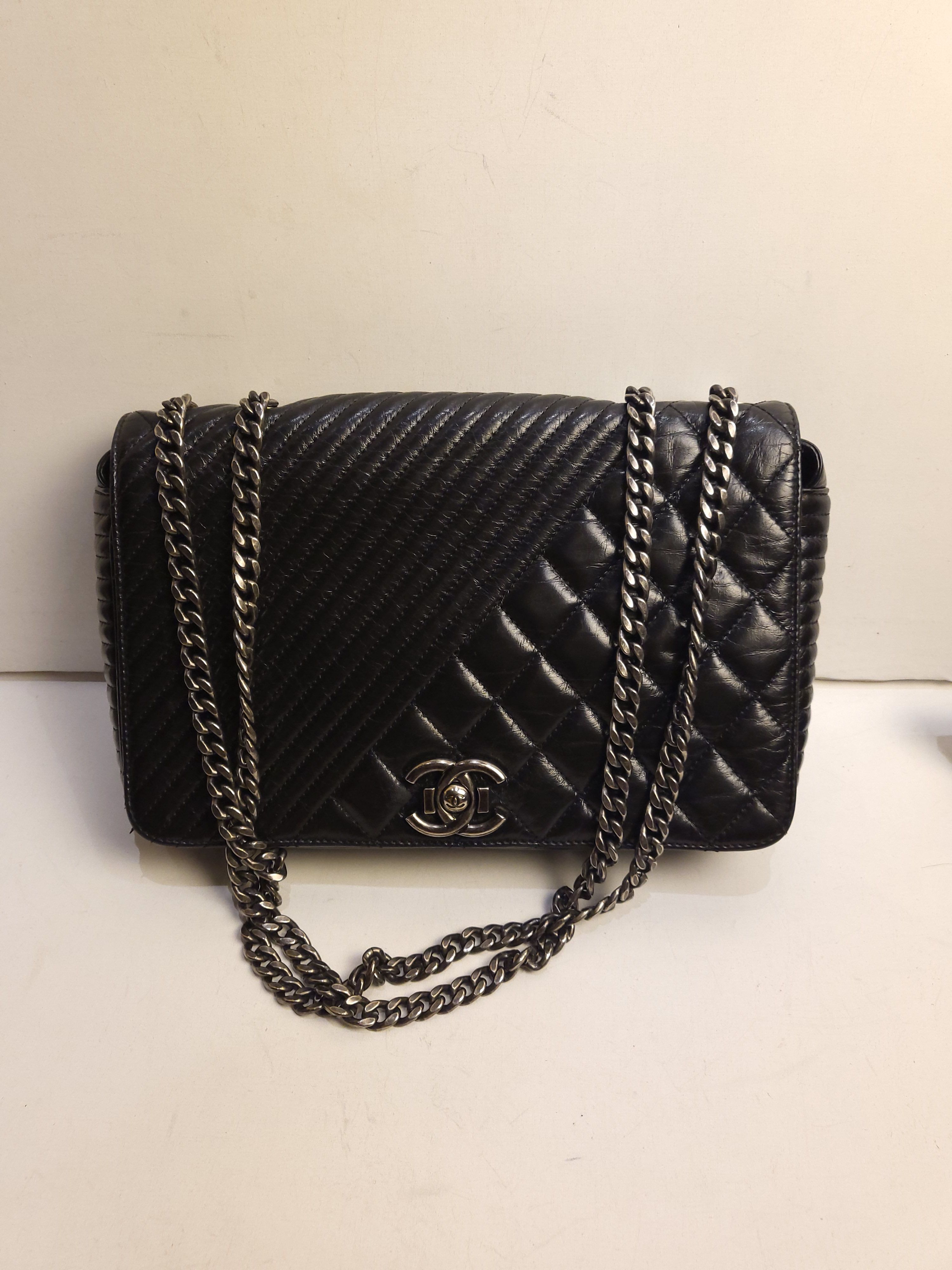 Preowned Chanel Black Diagonal  Quilted Leather Flap Bag