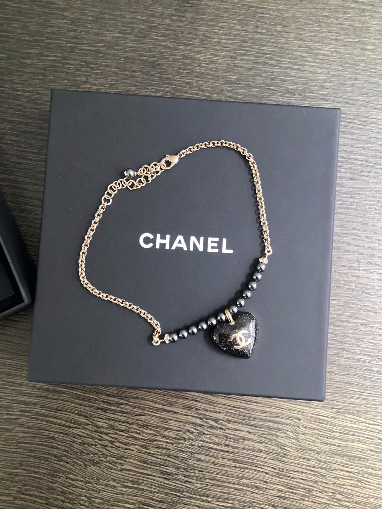 Preowned Chanel Champagne Gold and Black Heart Pendant Necklace Gold / Black metal