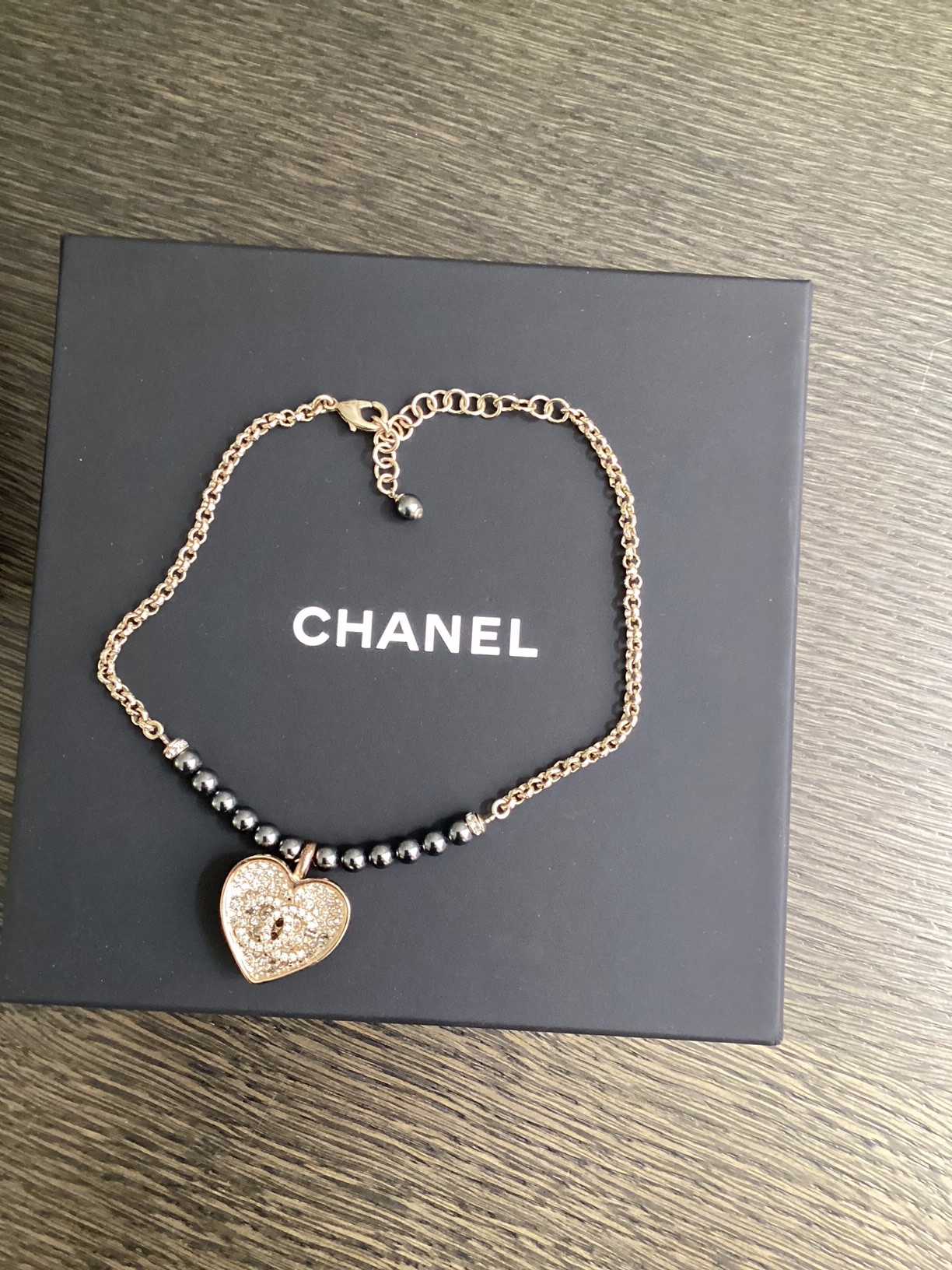 Preowned Chanel Champagne Gold and Black Heart Pendant Necklace Gold / Black metal