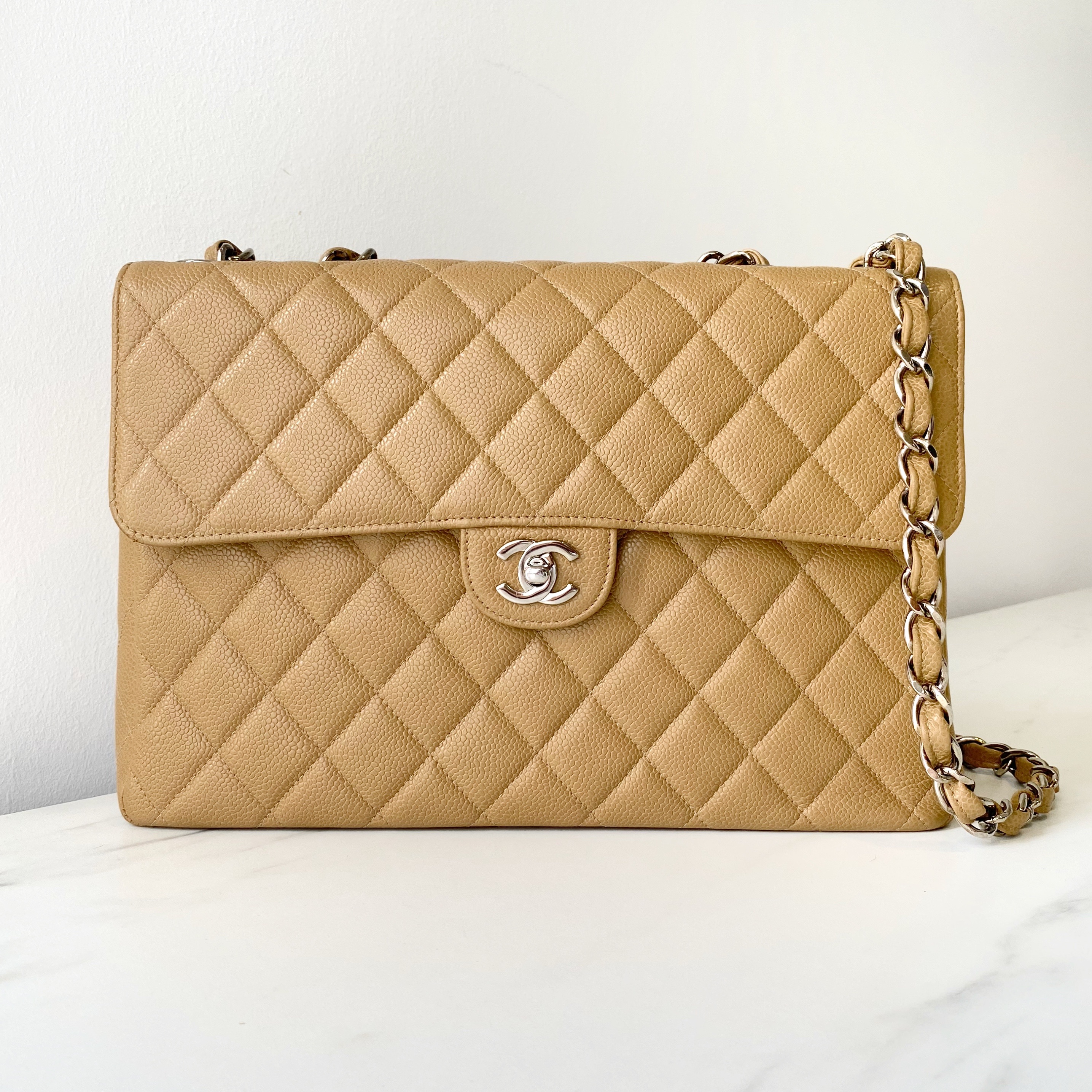 Preowned Chanel Beige Caviar Leather Quilted Jumbo Flap Bag Yellow