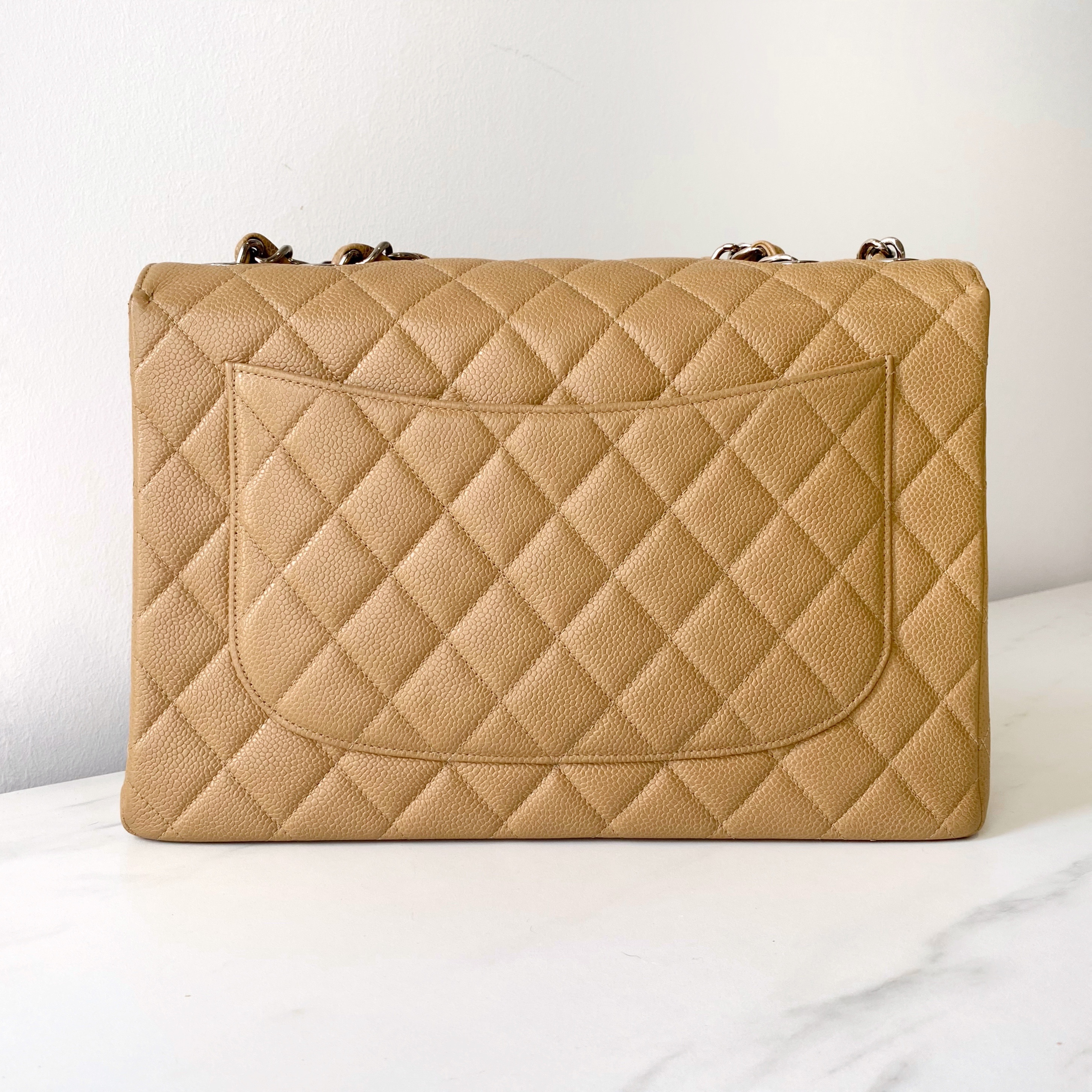 Preowned Chanel Beige Caviar Leather Quilted Jumbo Flap Bag Yellow