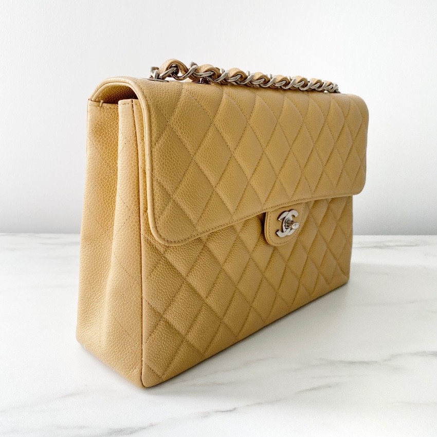 Preowned Chanel Beige Caviar Leather Quilted Jumbo Flap Bag Yellow