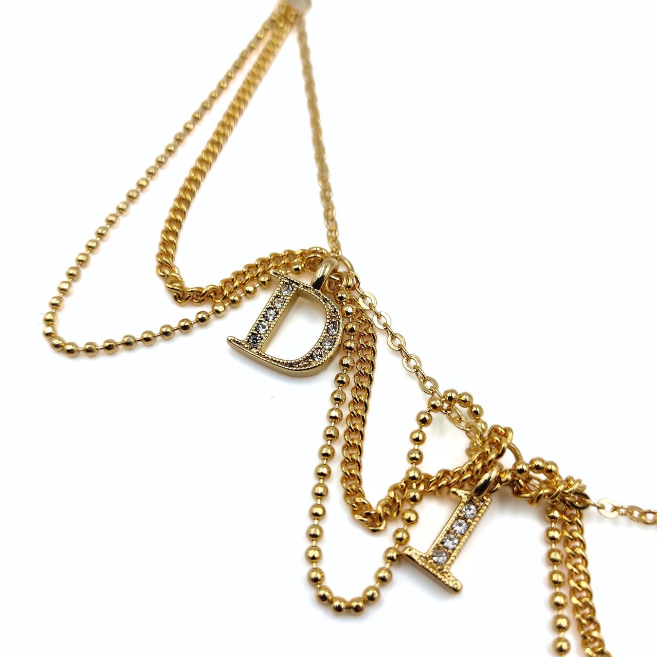 Dior Dior women's necklace in golden metal and rhinestones - '10s