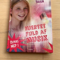 Olivias MGP 1 hjertet fuld af musik Bog