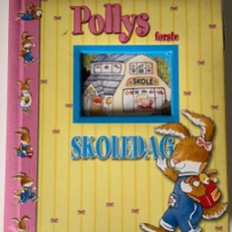 Pollys første skoledag Bog