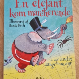 En elefant kom marcherende Bog