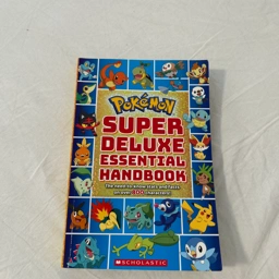 Pokemon Super Deluxe Essential Handbook Bog