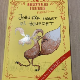 John får noget på hovedet Bog