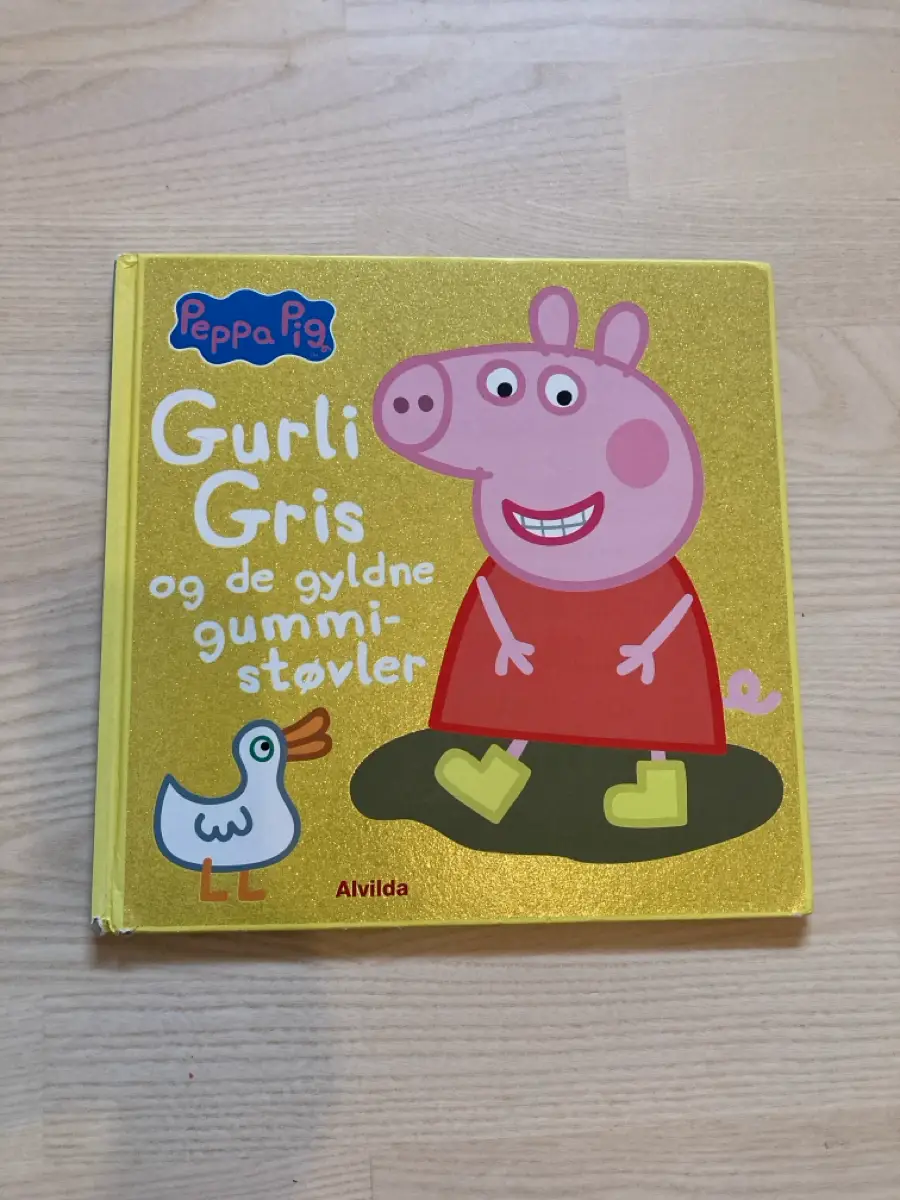 Gurli Gris og de gyldne gummistøvler Bog