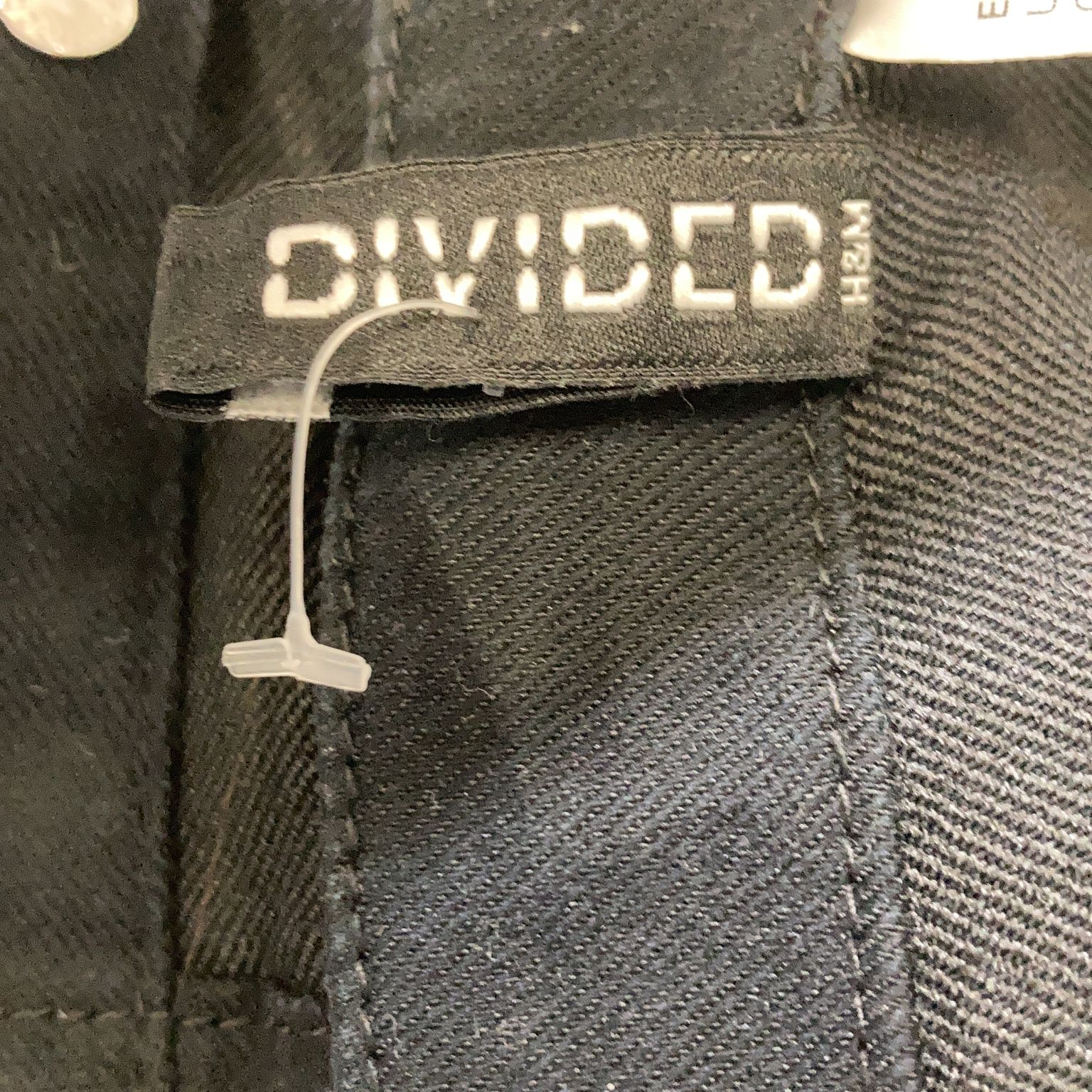 Divided by HM