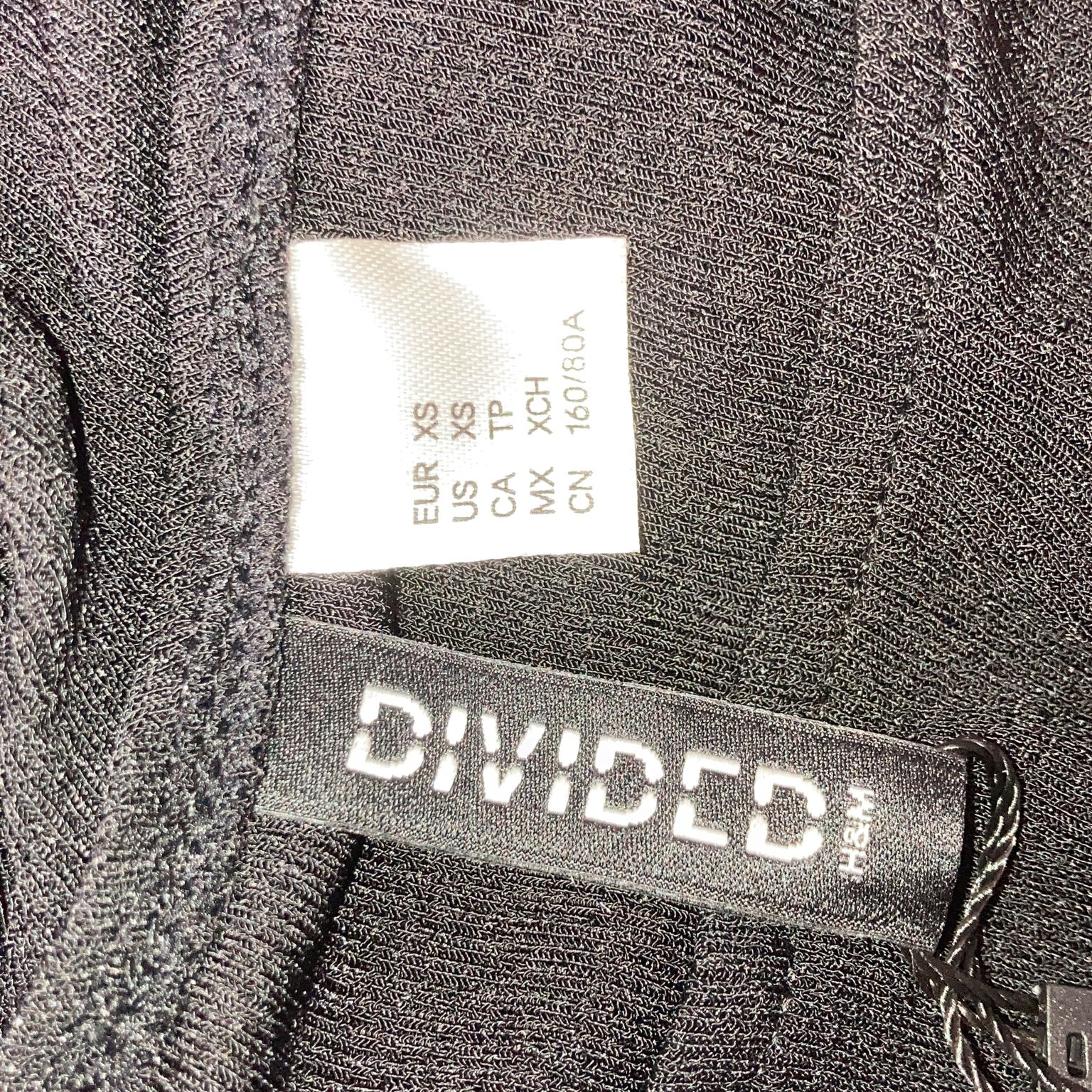 Divided by HM