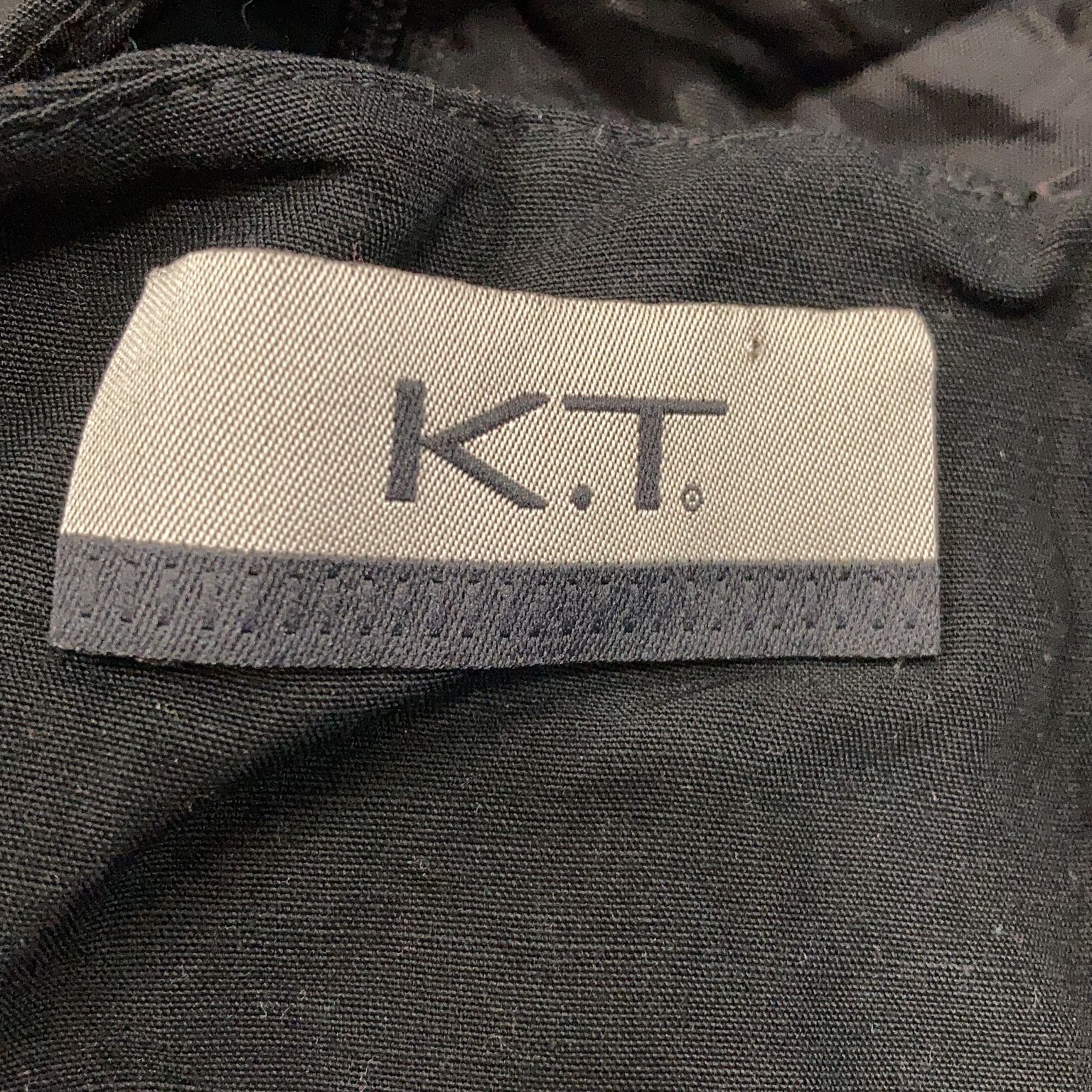 K.T