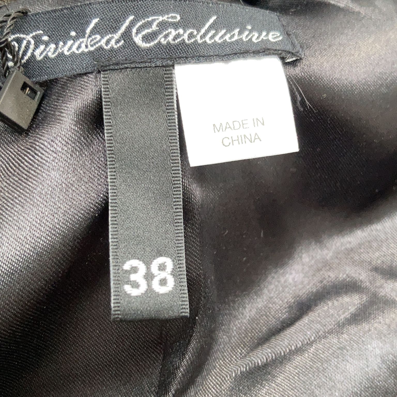 Divided Exclusive by HM