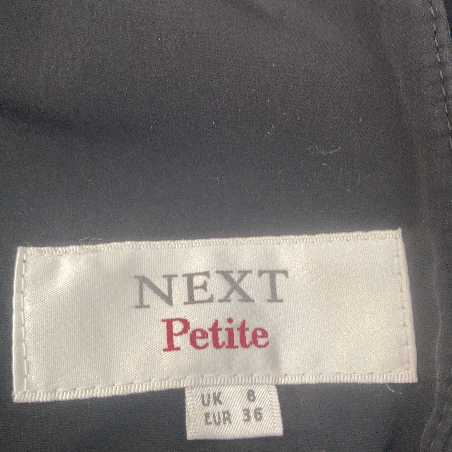 Next Petite