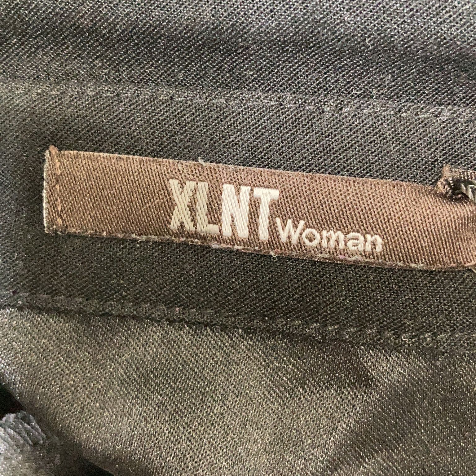 XLNT Woman