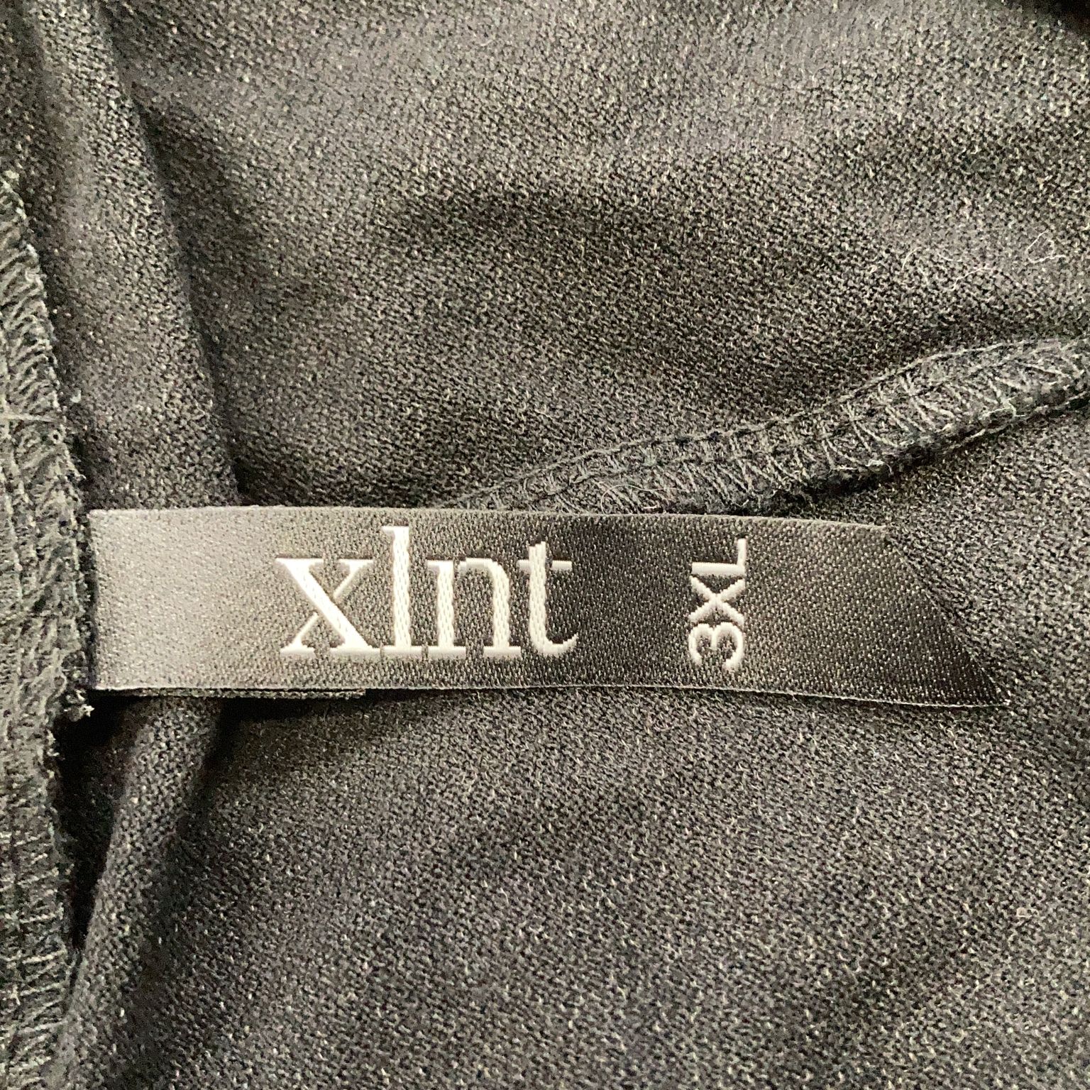 XLNT Woman