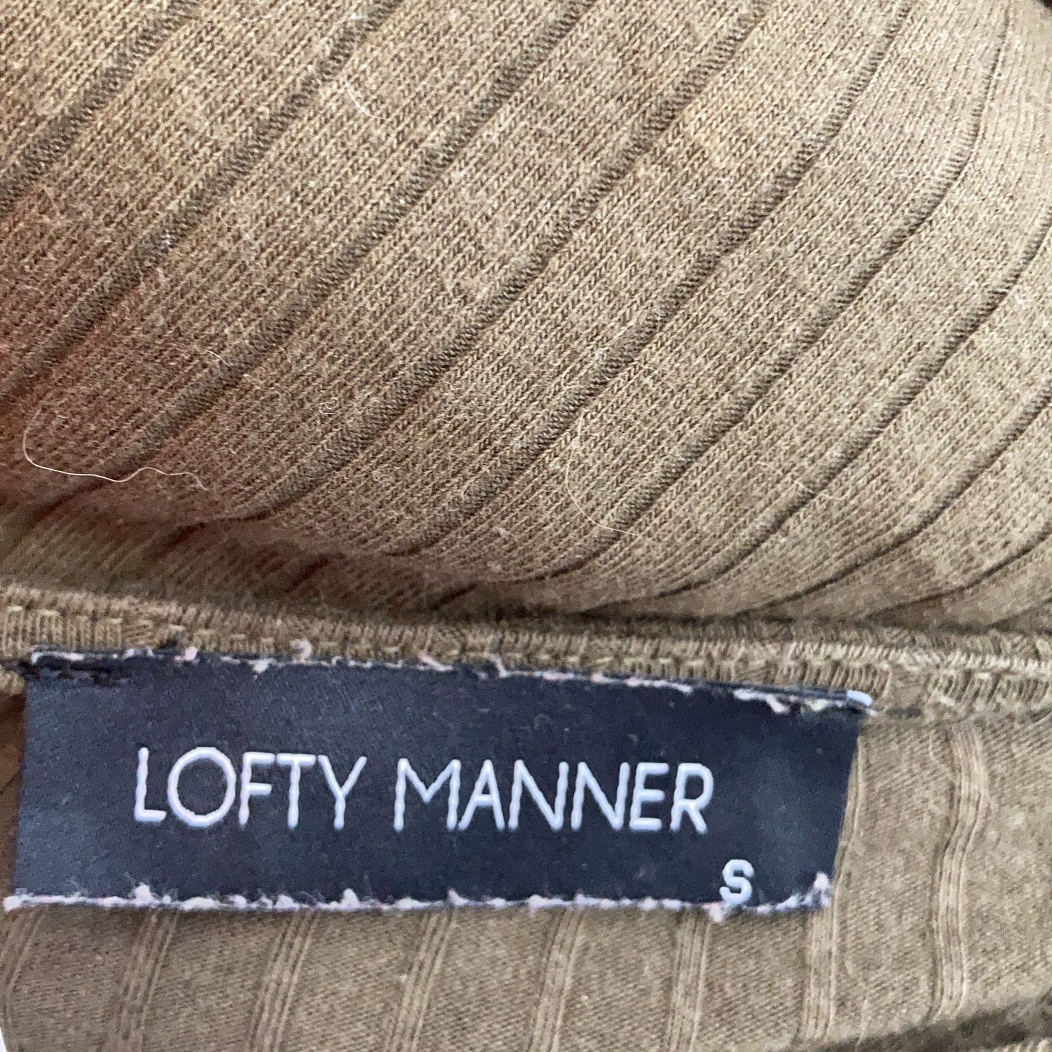 Lofty Manner