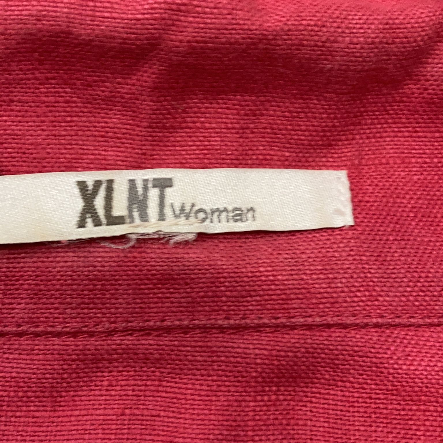 XLNT Woman