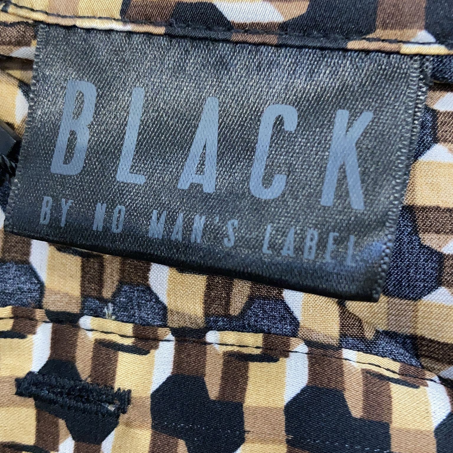 Black by No Man's Label