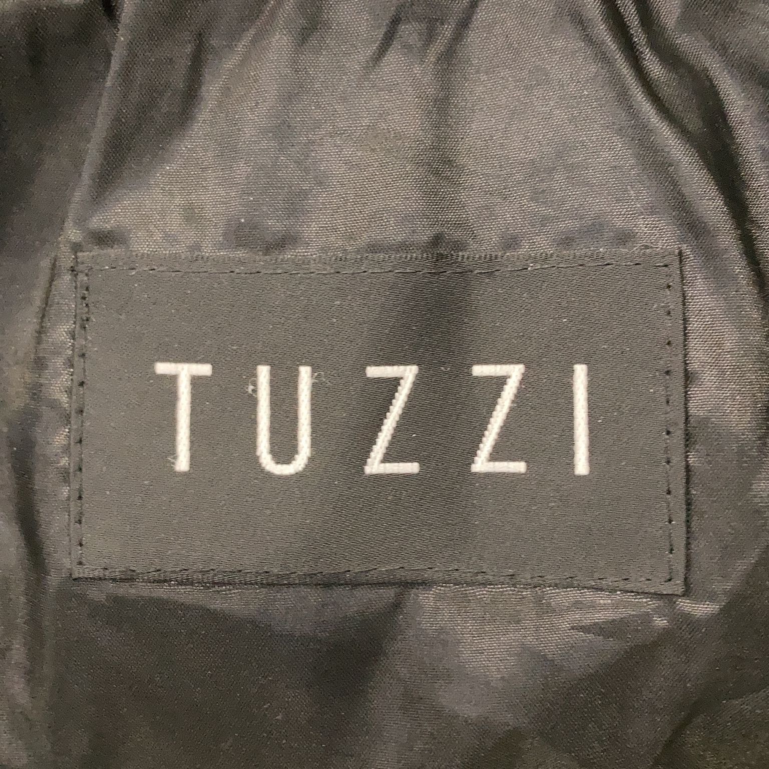 Tuzzi