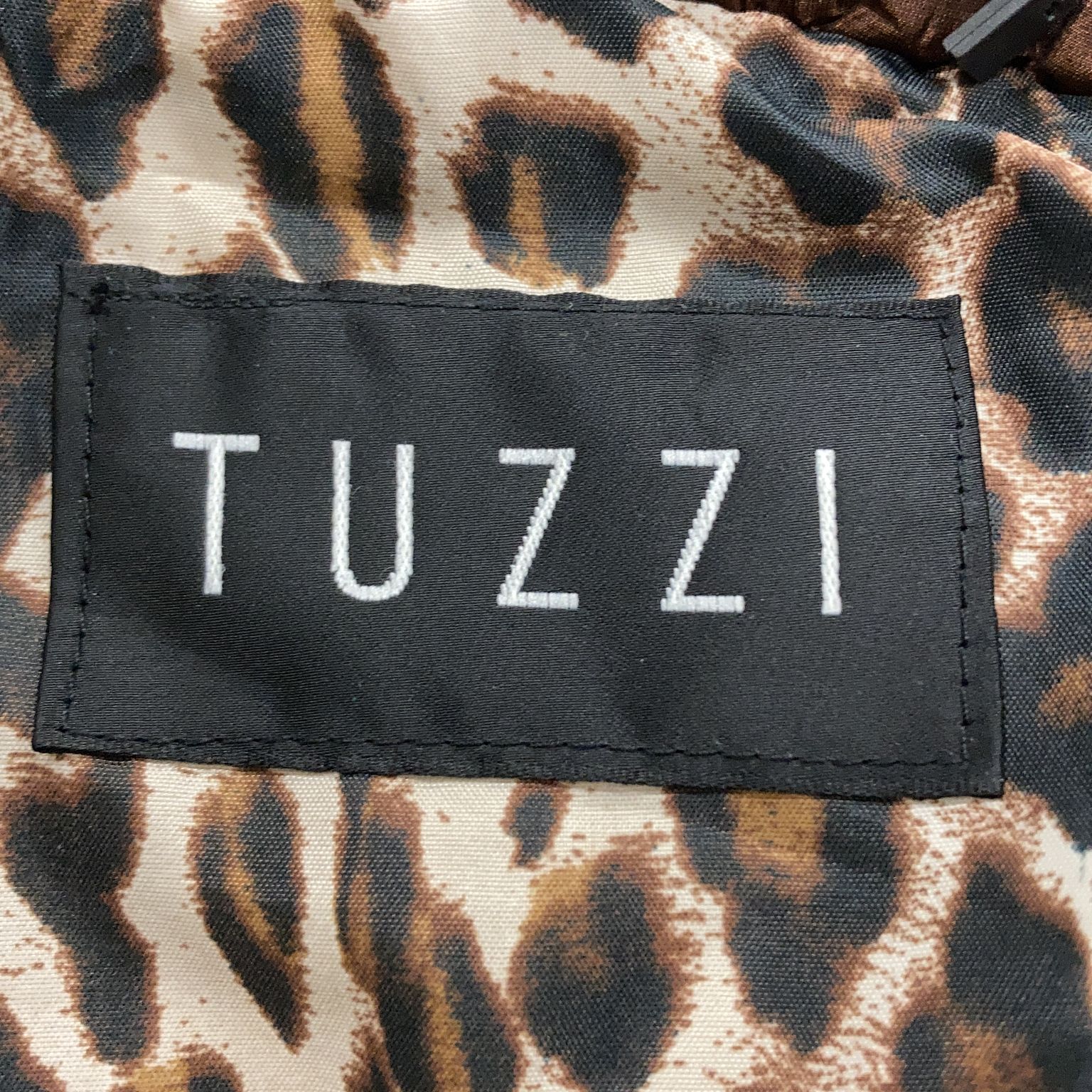 Tuzzi