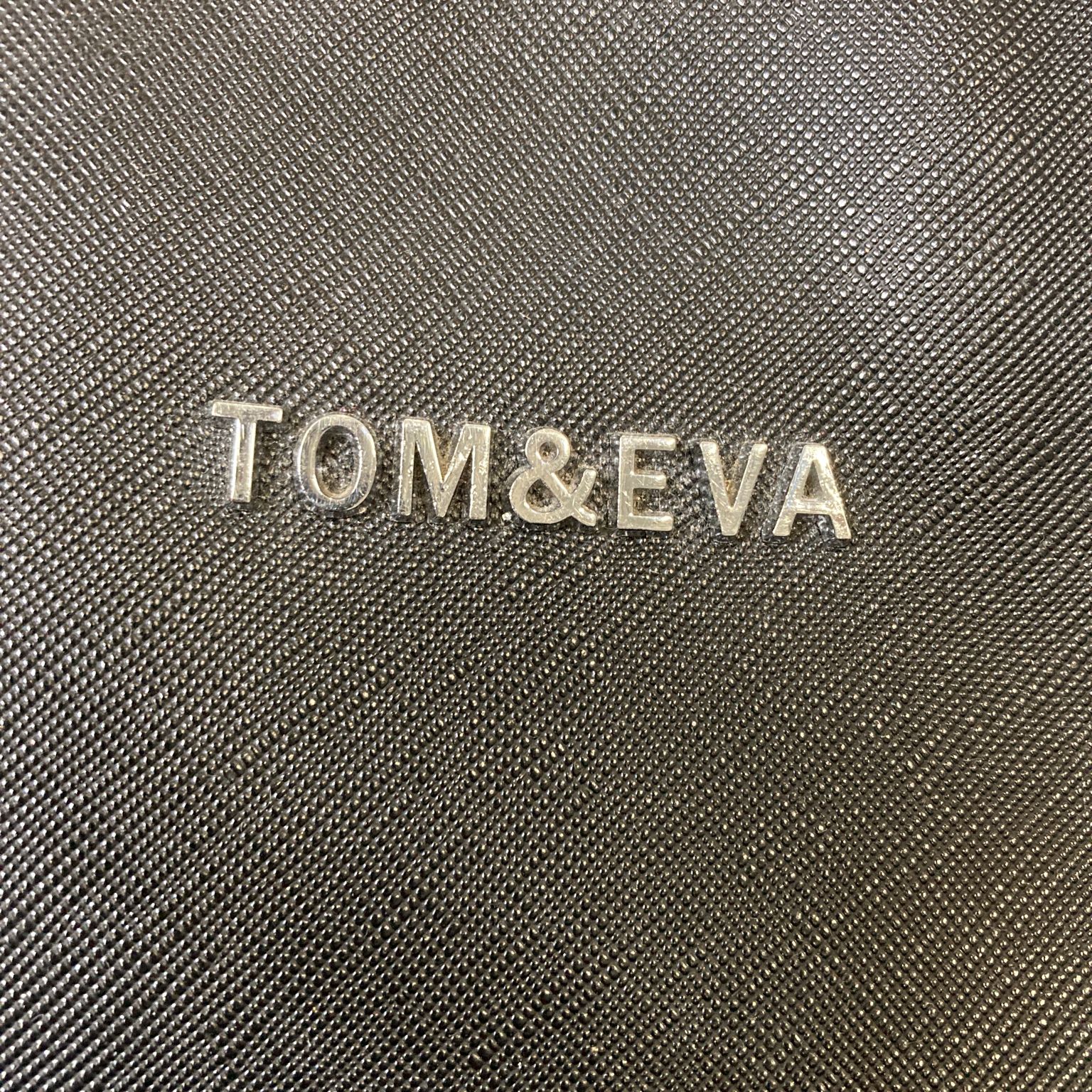 Tom  Eva