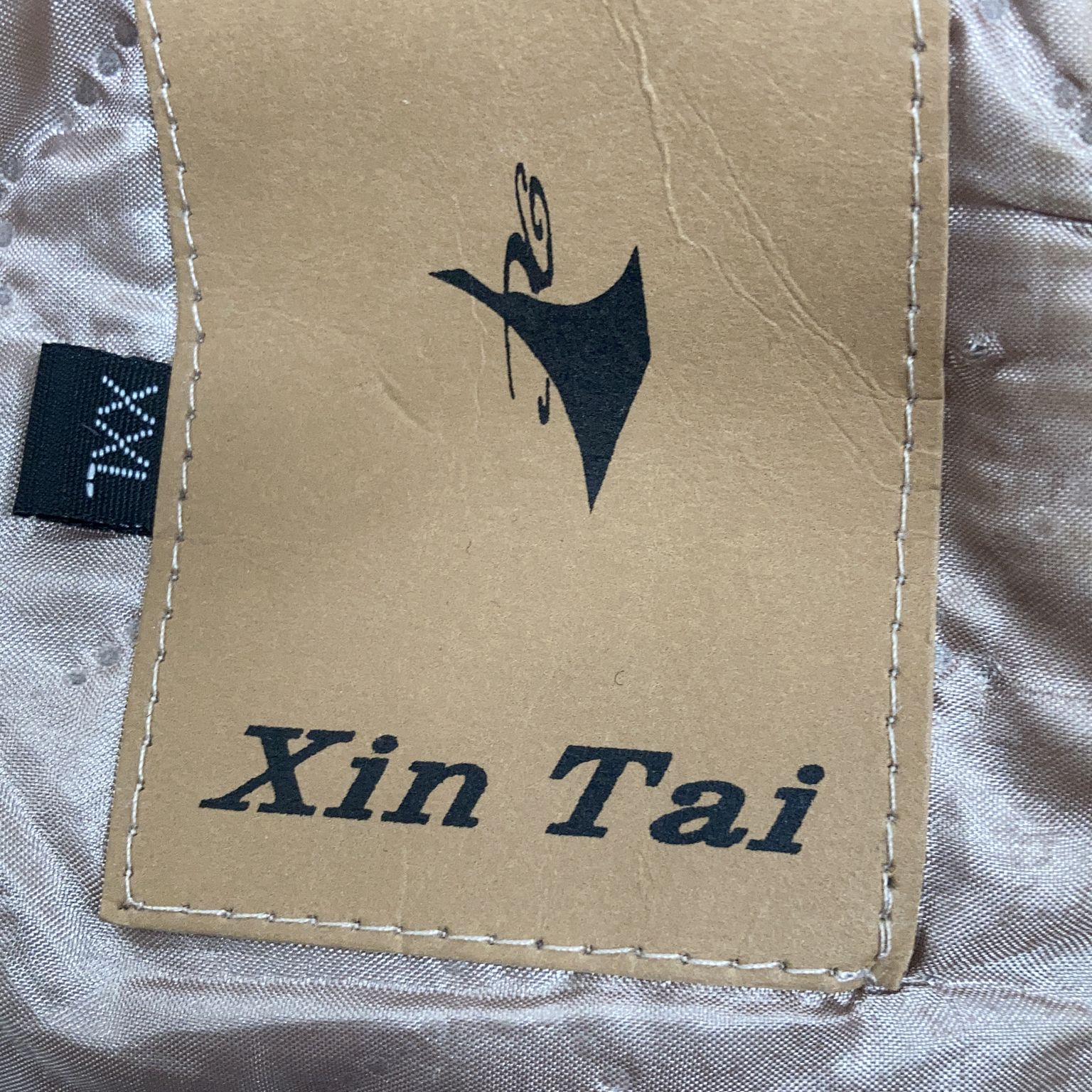 Xin Tai