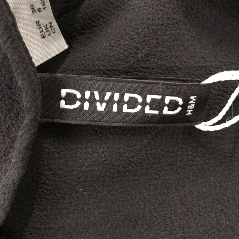 Divided by HM