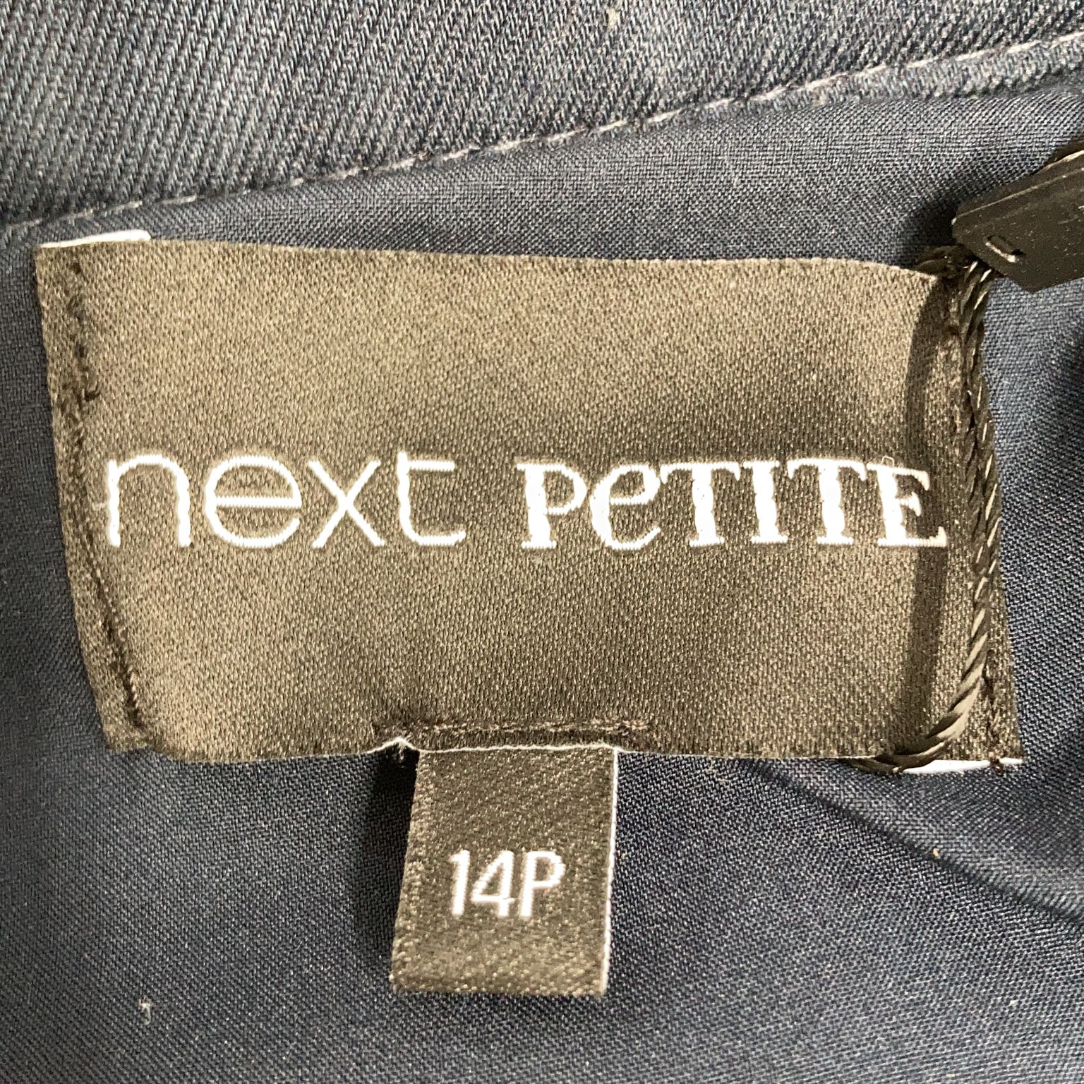 Next Petite