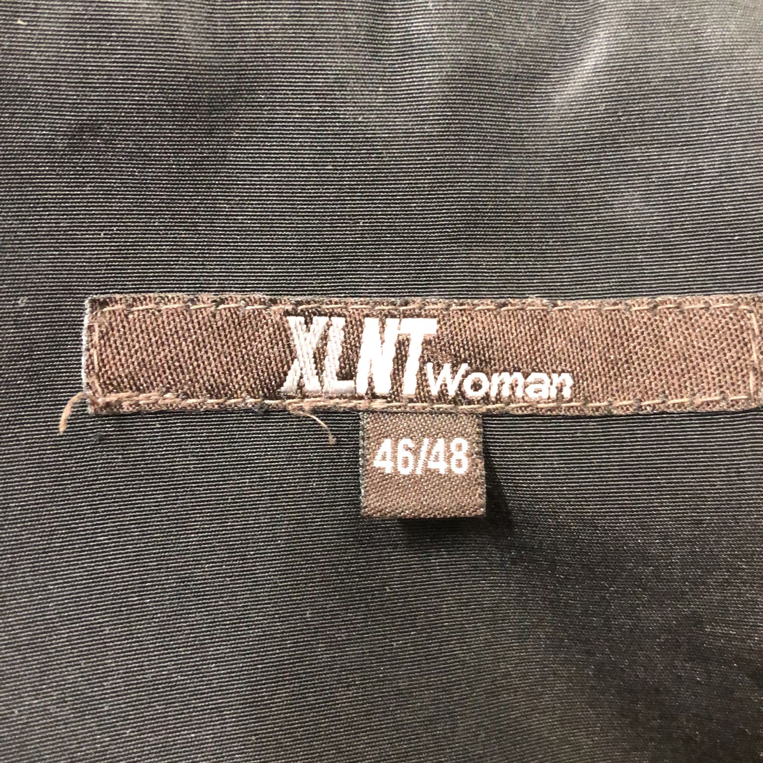 XLNT Woman