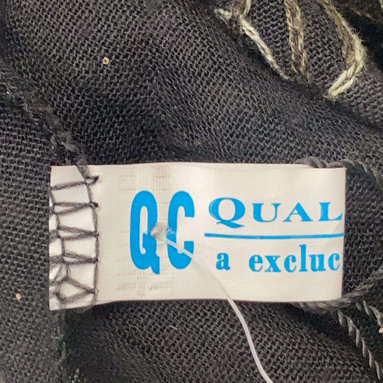 QC