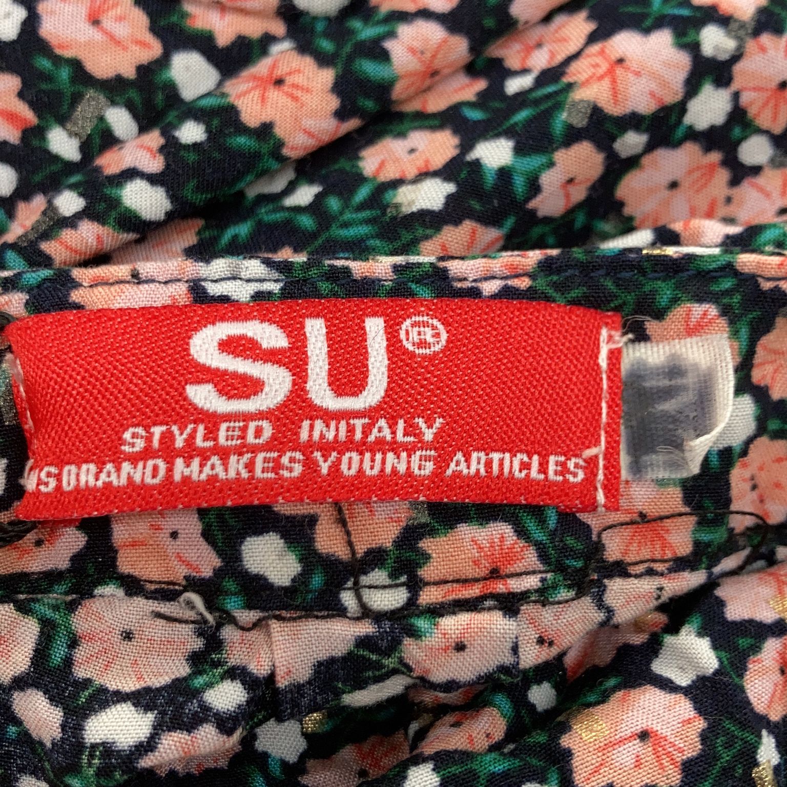 "SU"