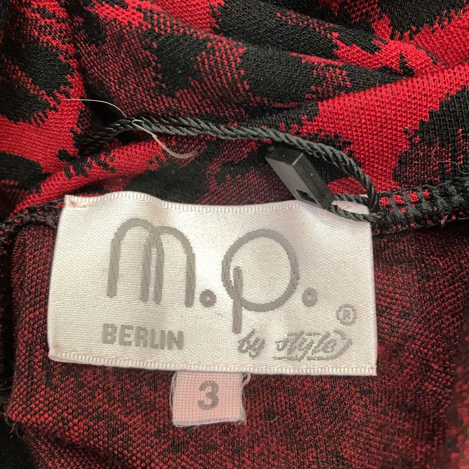 M.Q.