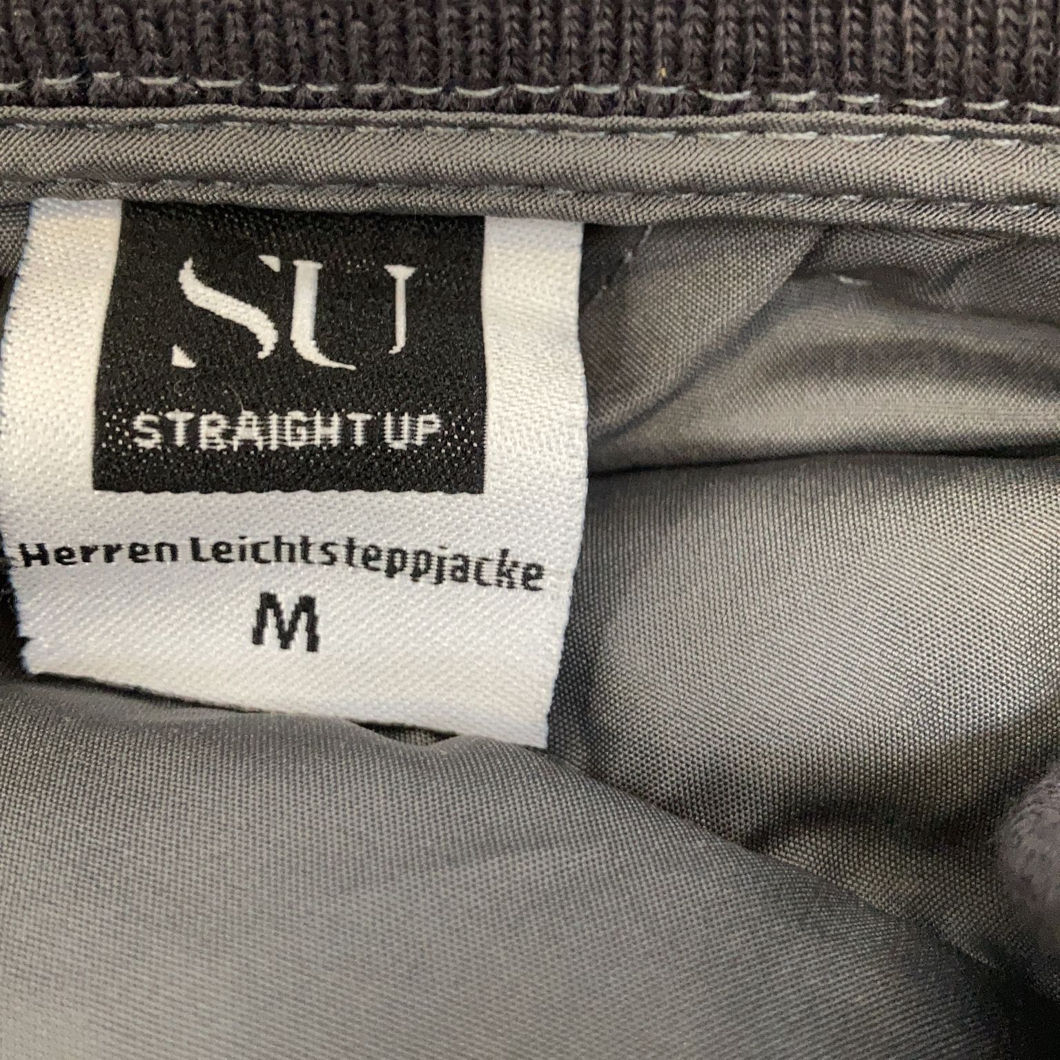 "SU"