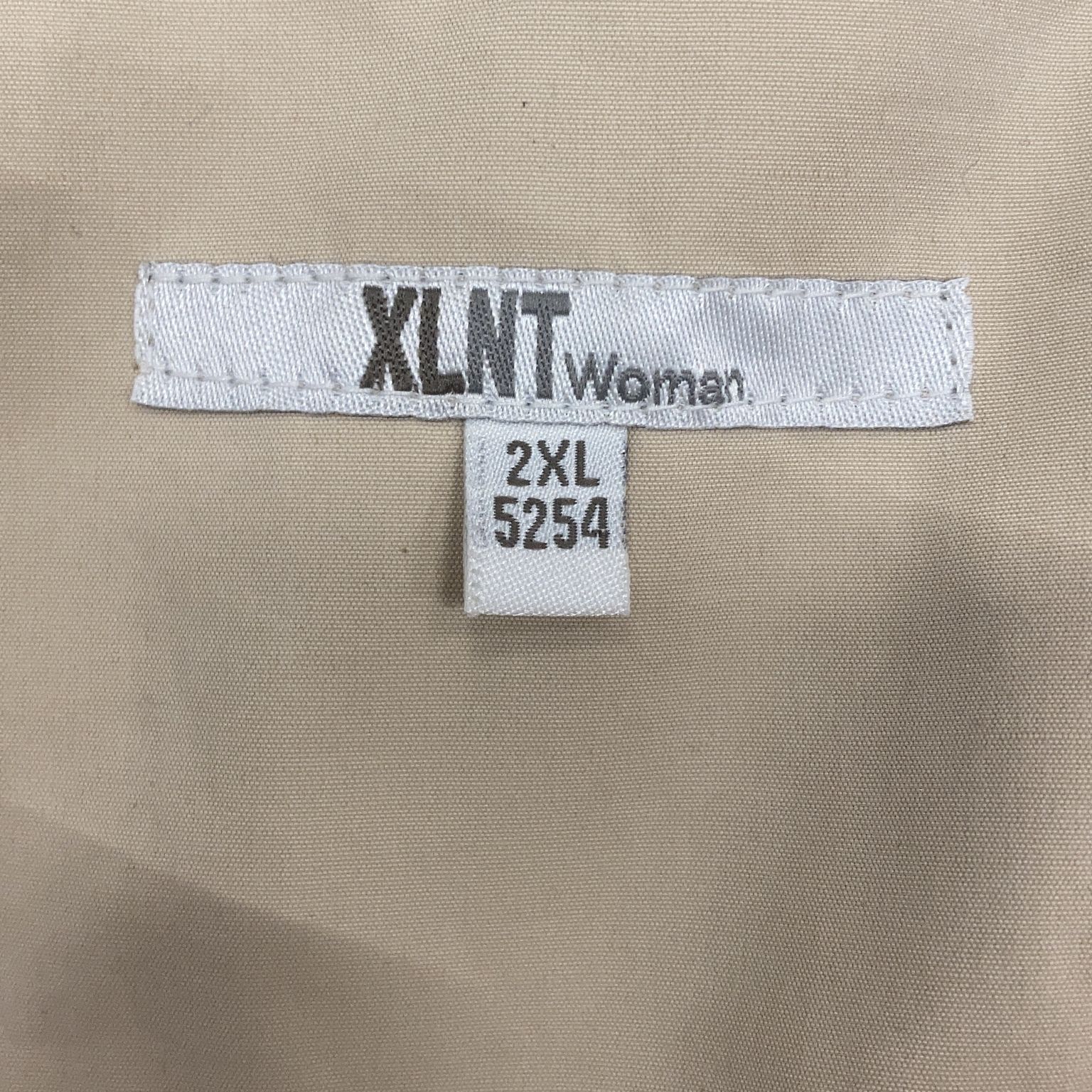 XLNT Woman