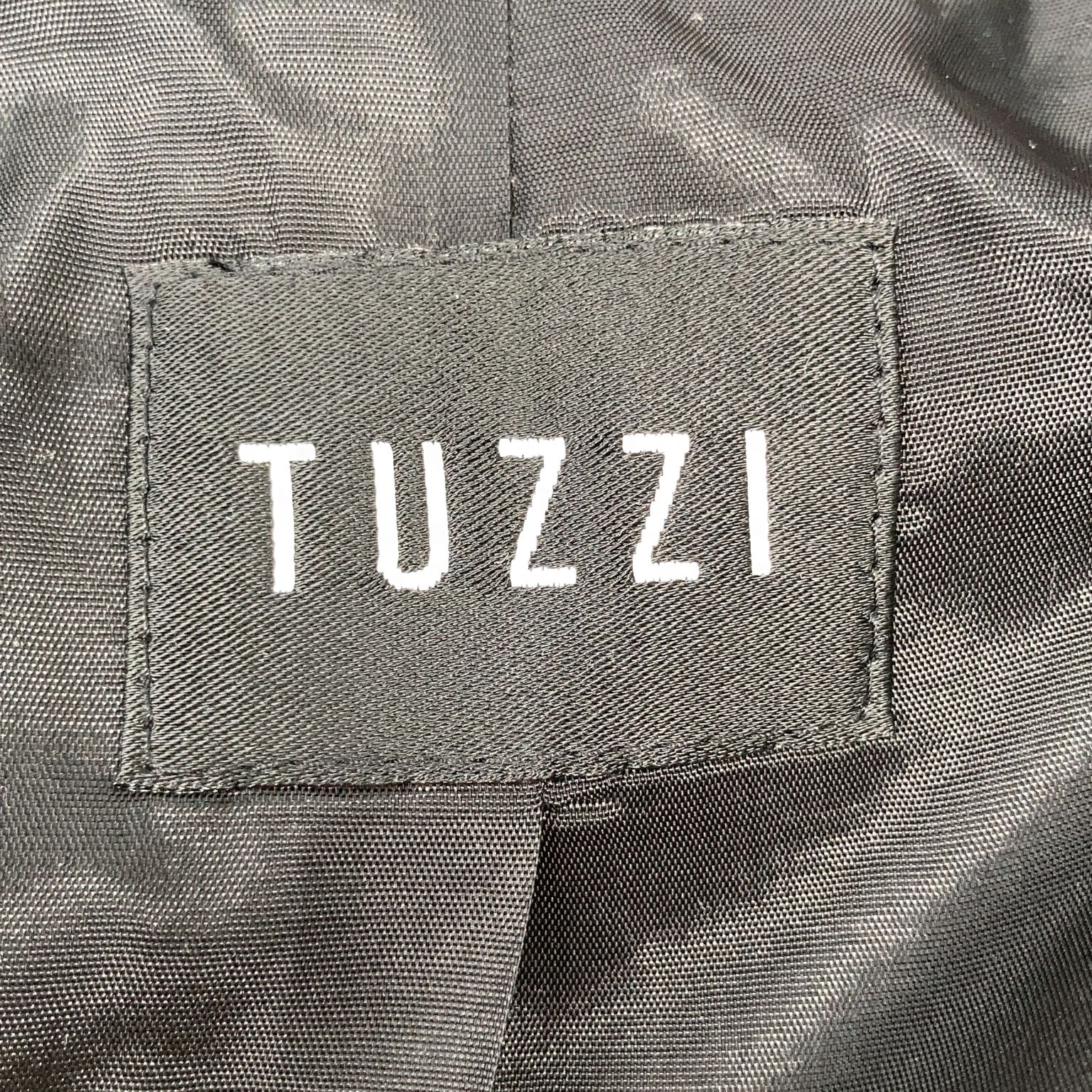 Tuzzi