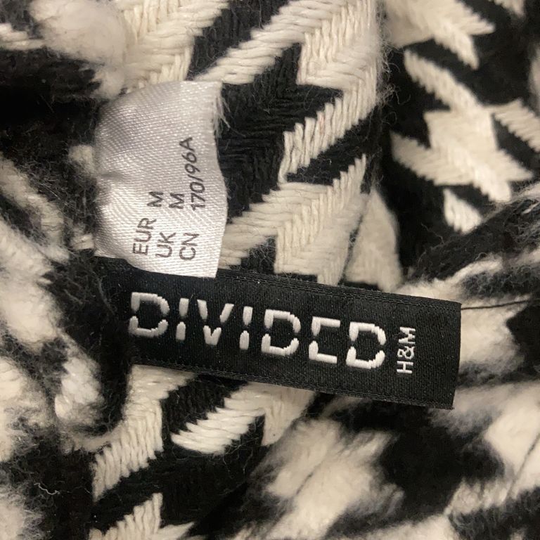 Divided by HM