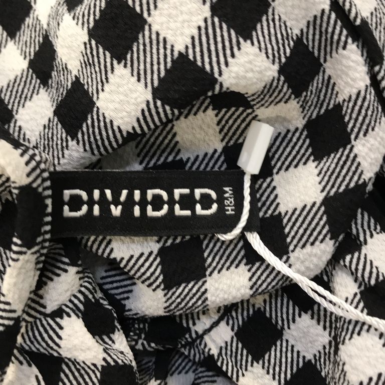 Divided by HM