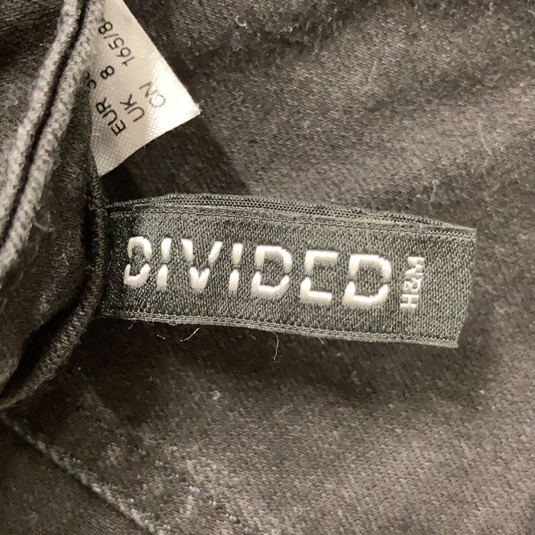 Divided by HM