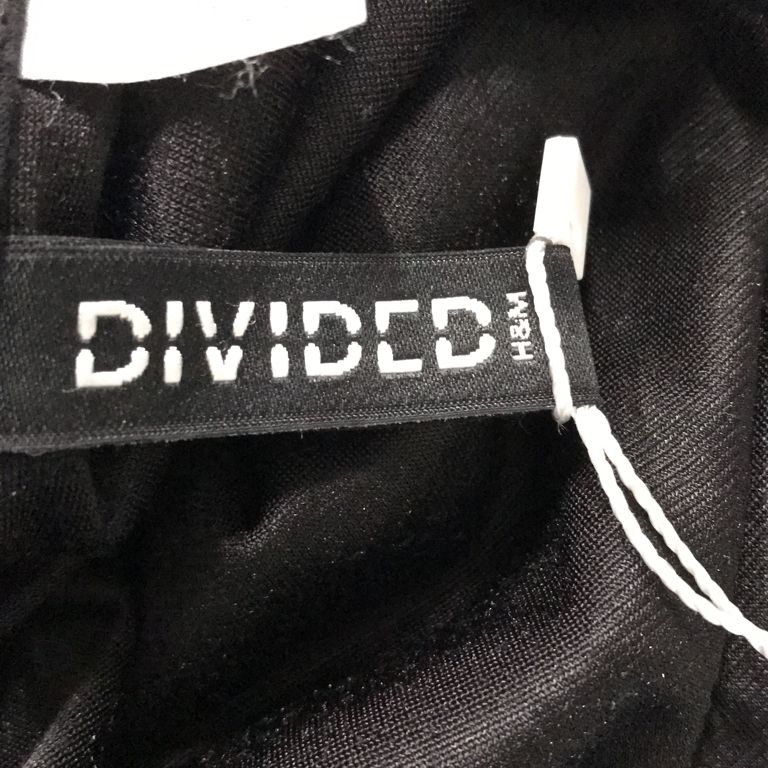 Divided by HM