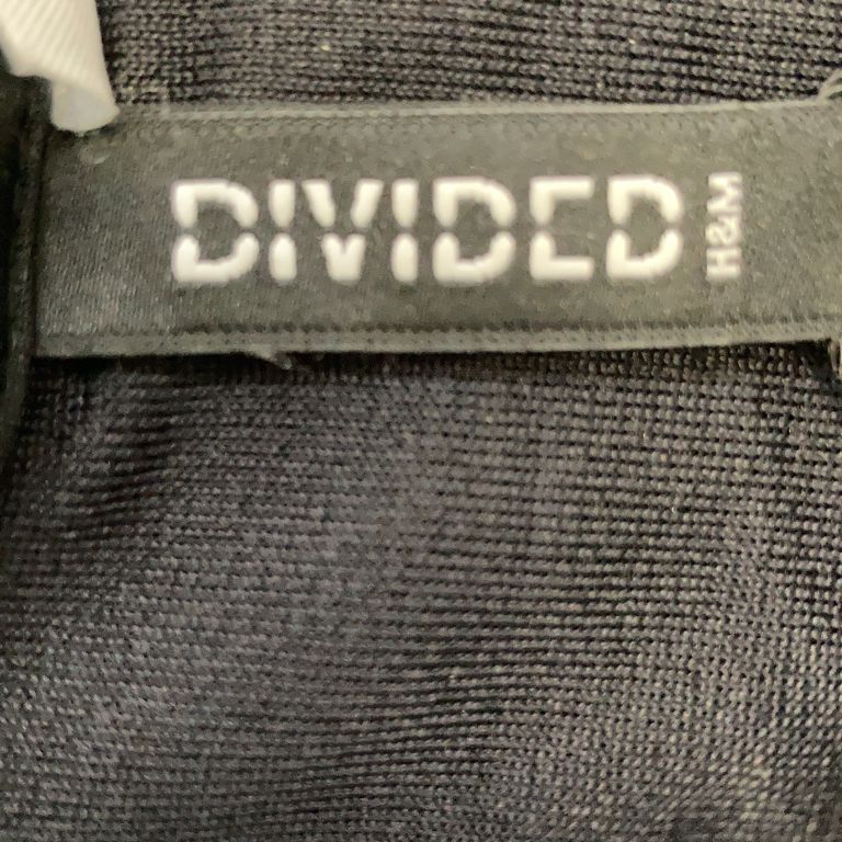 Divided by HM