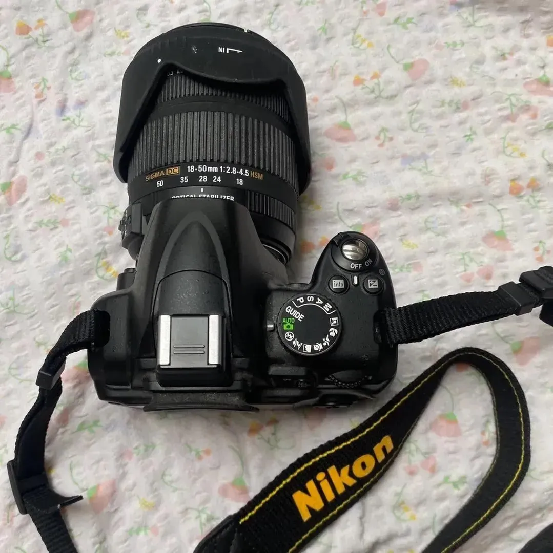 Nikon D3000 + lense