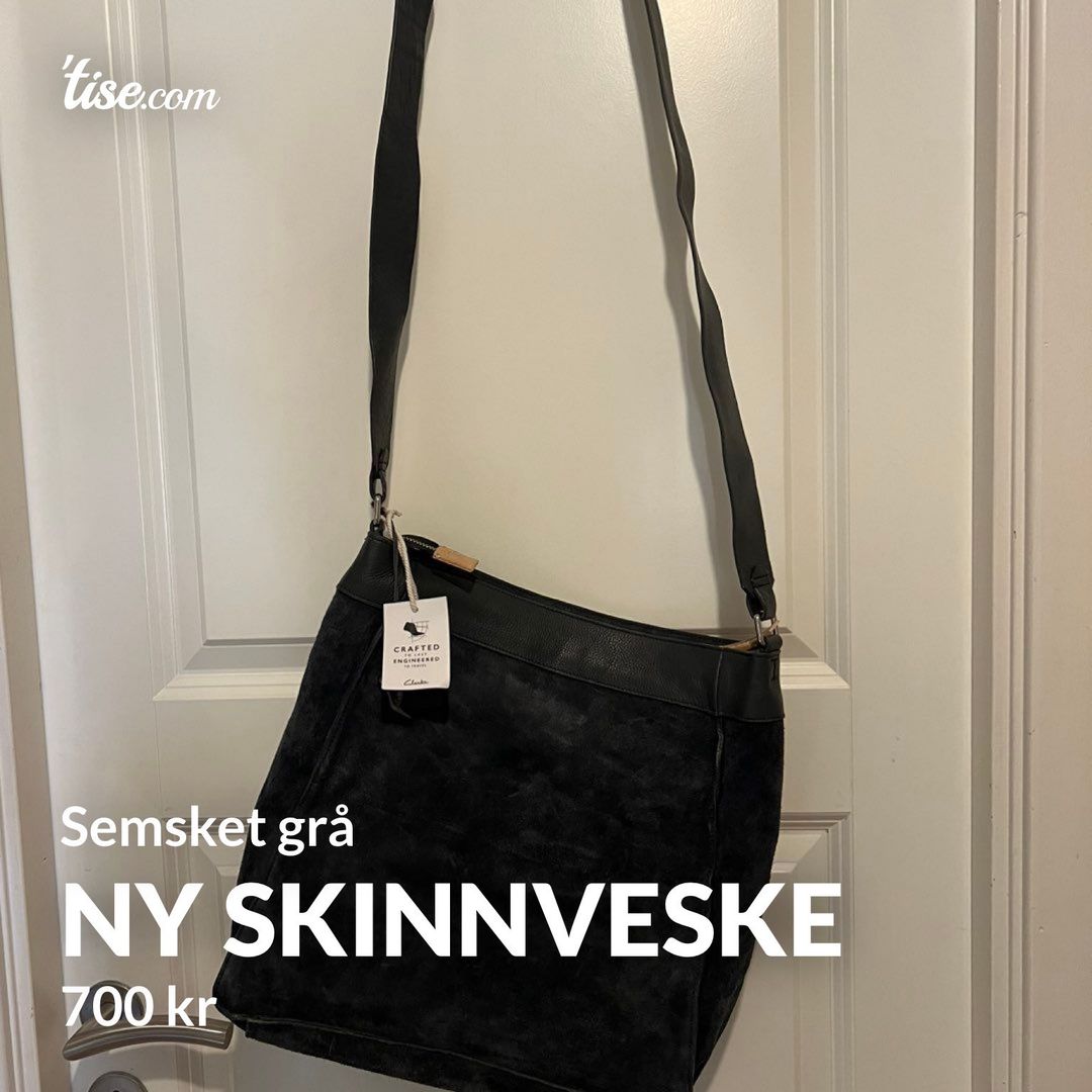 Ny skinnveske