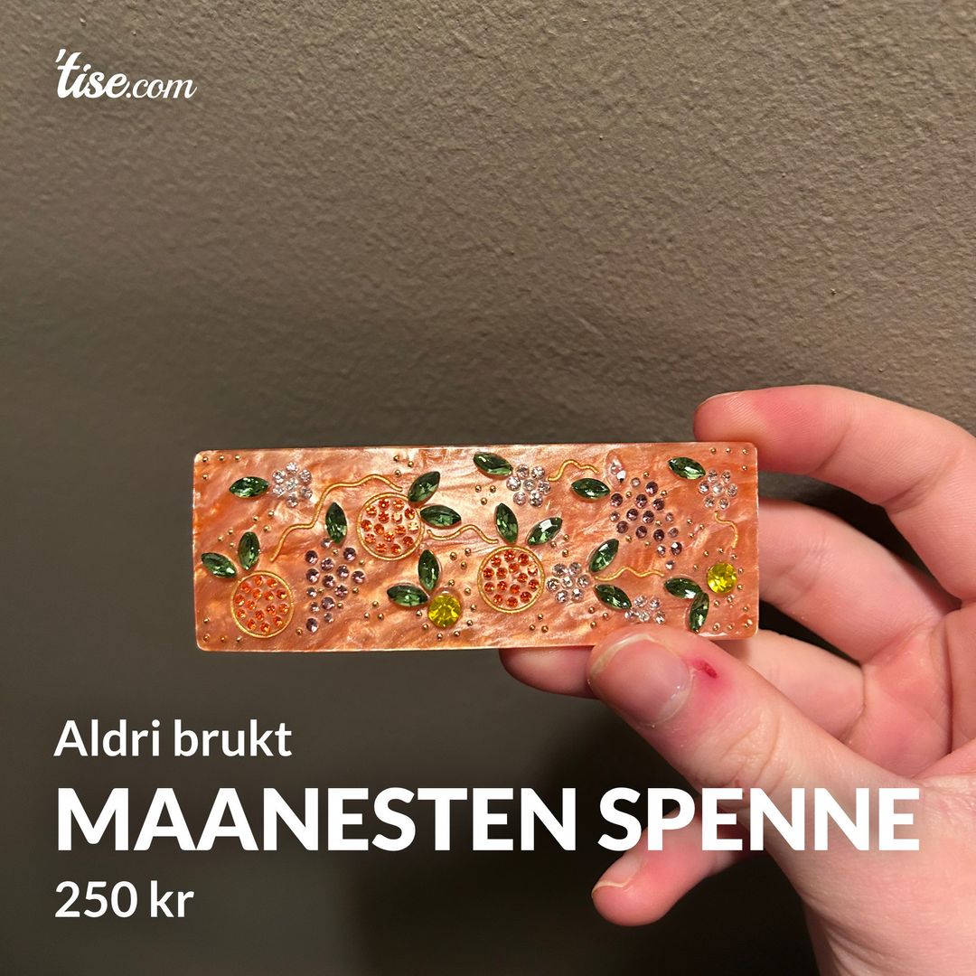 Maanesten spenne