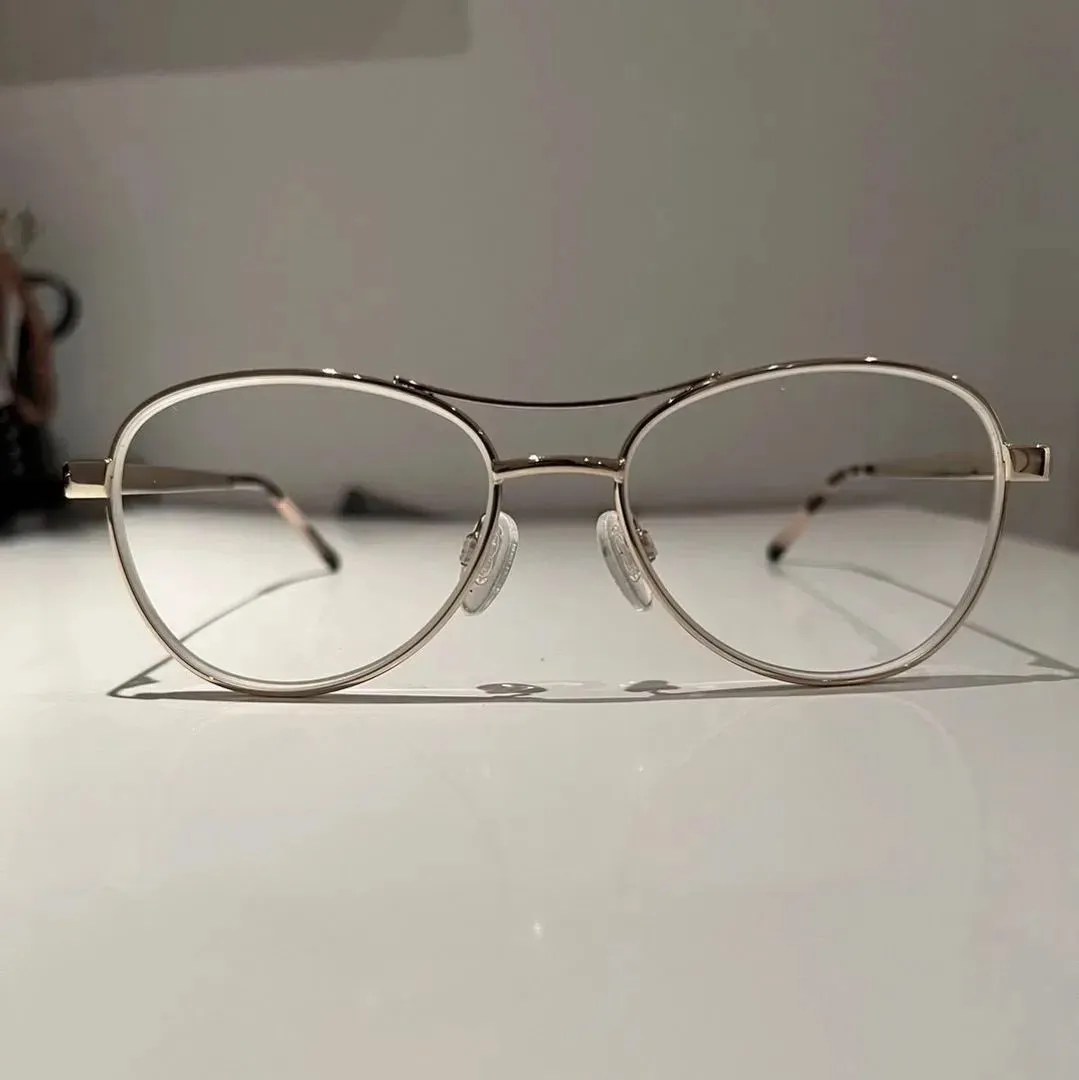 Gold frame glasses